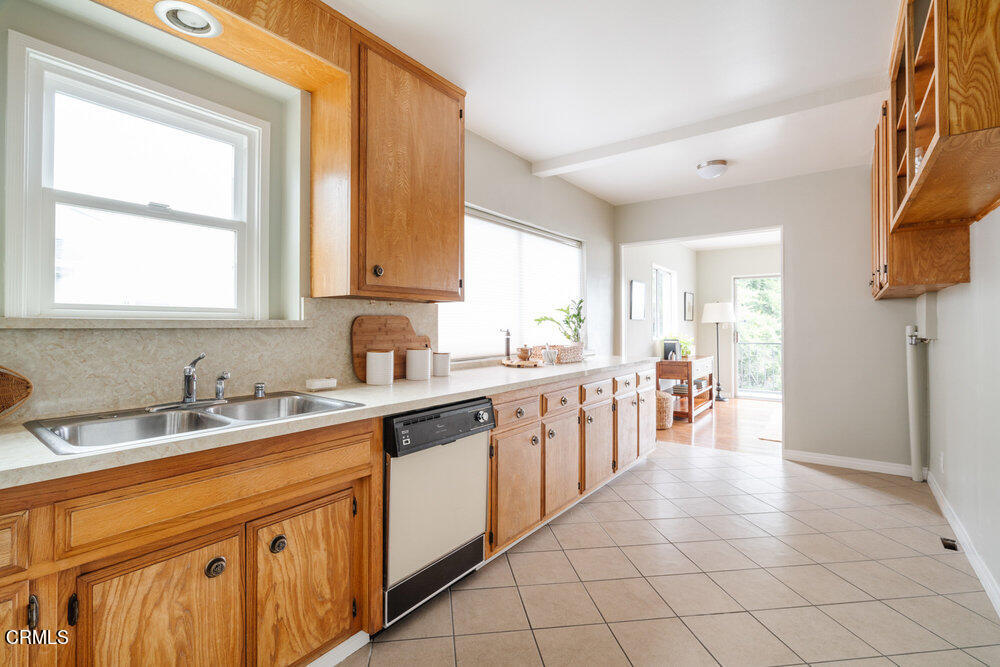 126 West Pine Street Altadena, CA 91001 - Photo 8 of 21 a kitchen with a sink and cabinets