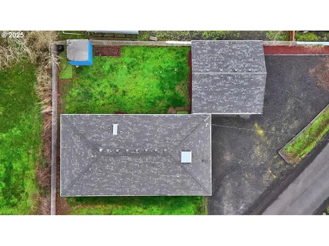 a black and white photo of a house