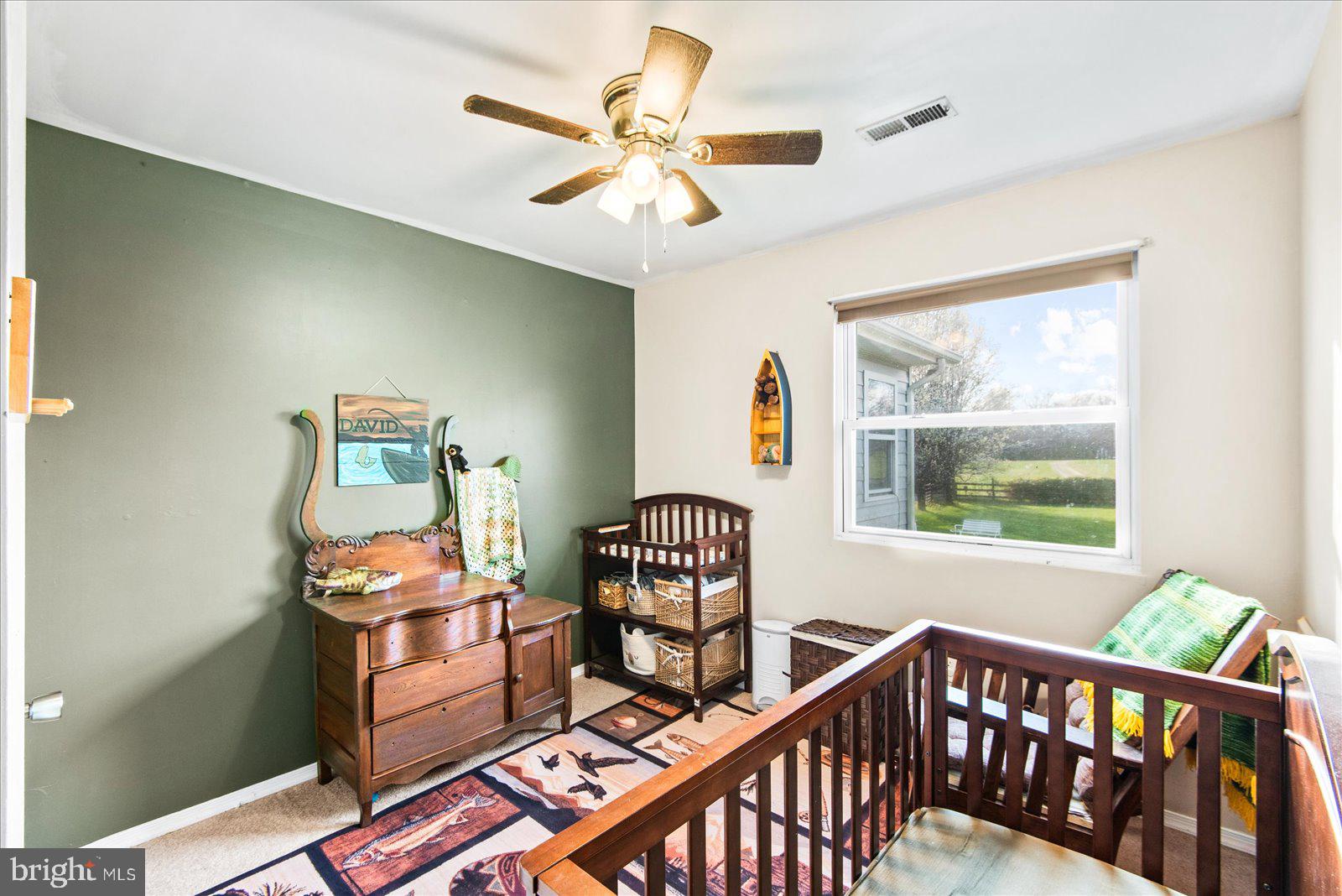 23165 Fork Bridge Road Milford, VA 22514 - Photo 21 of 51 a bedroom with furniture and a window