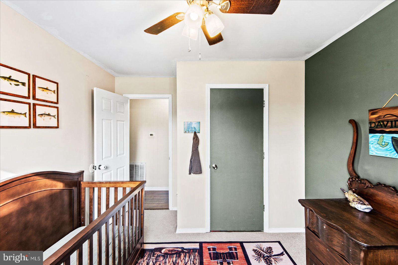 23165 Fork Bridge Road Milford, VA 22514 - Photo 22 of 51 a view of a hallway to a livingroom with furniture