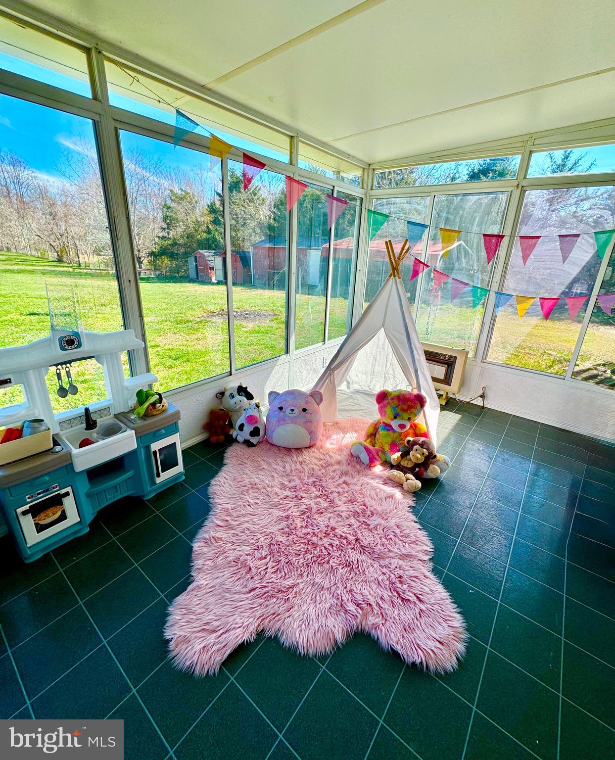 23165 Fork Bridge Road Milford, VA 22514 - Photo 26 of 51 a bed room with a bed and a wooden floor