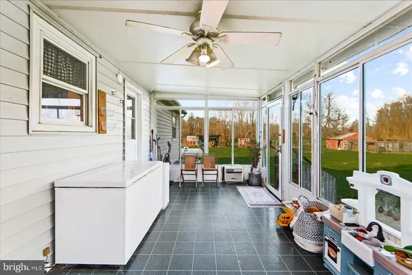 a bed room with a bed and a wooden floor