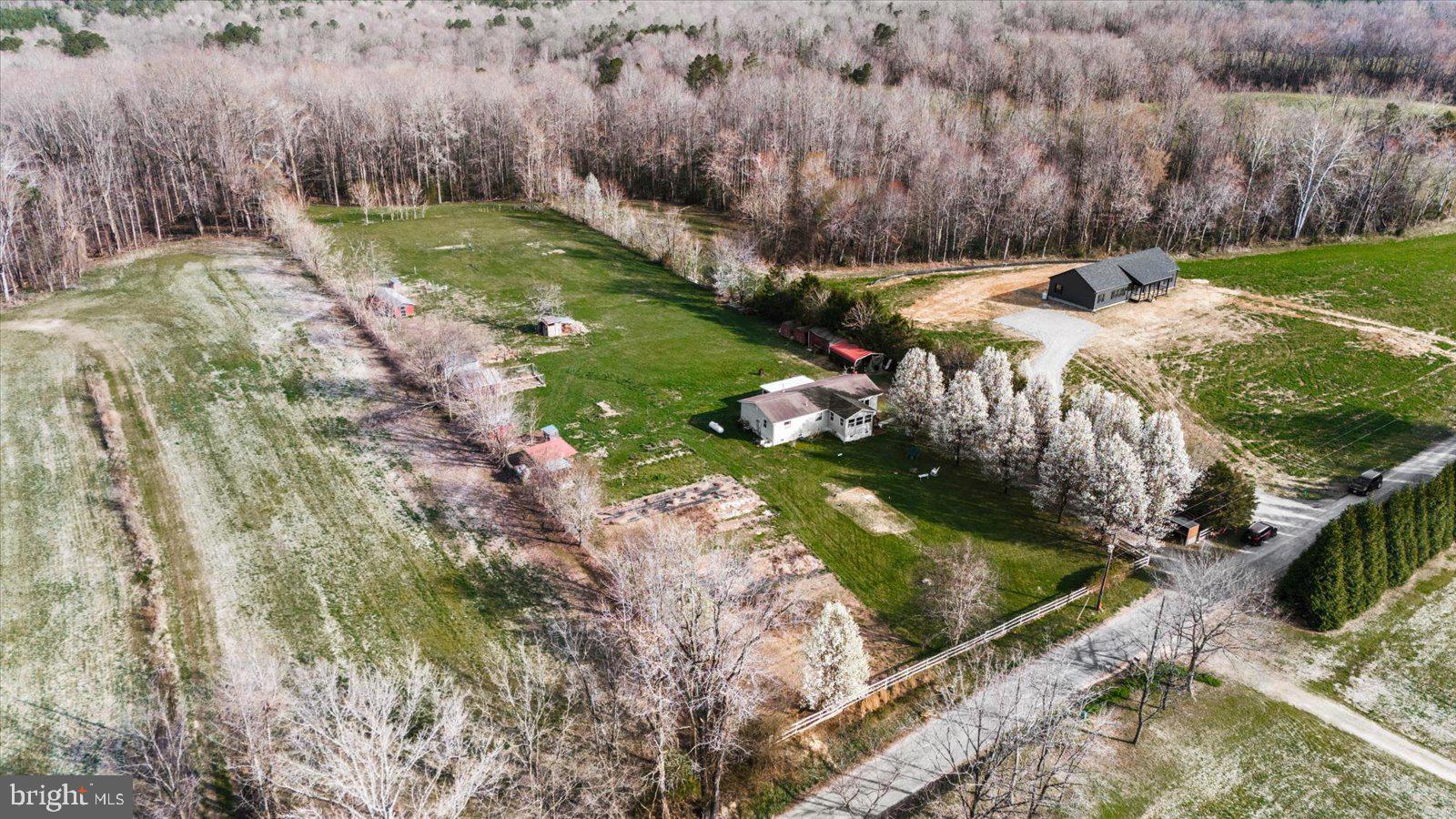 23165 Fork Bridge Road Milford, VA 22514 - Photo 39 of 51 a view of a lake with huge green field