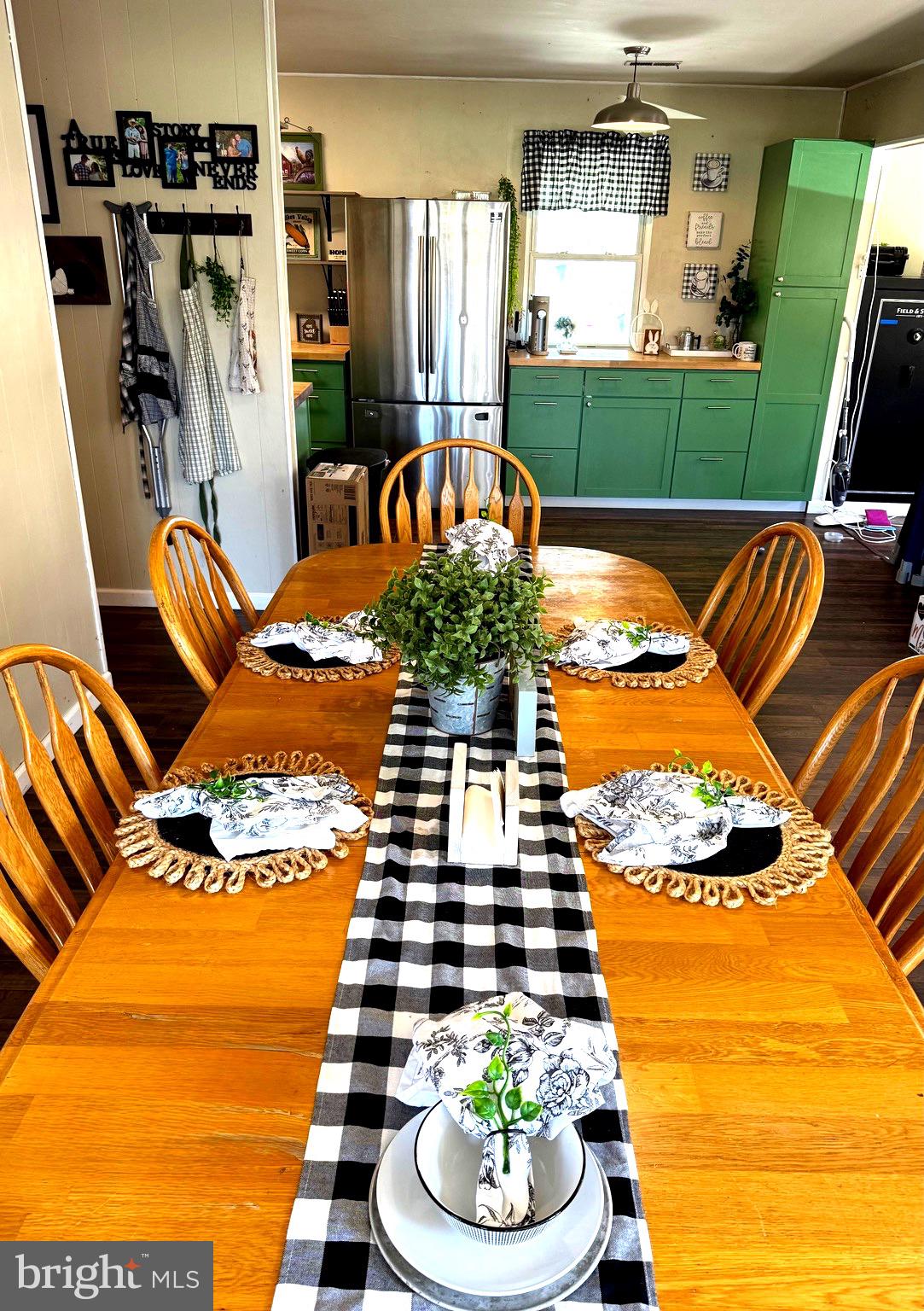 23165 Fork Bridge Road Milford, VA 22514 - Photo 6 of 51 a view of a patio with dining table and chairs