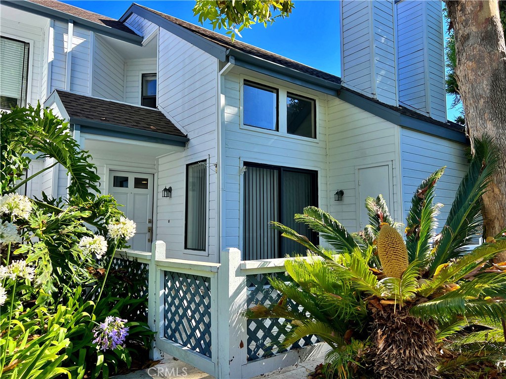 a plant is in front of a house