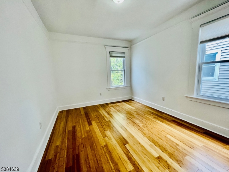 169 Hillside Avenue, Unit 2 Glen Ridge, NJ 07028 - Photo 4 of 10 a view of empty room with window