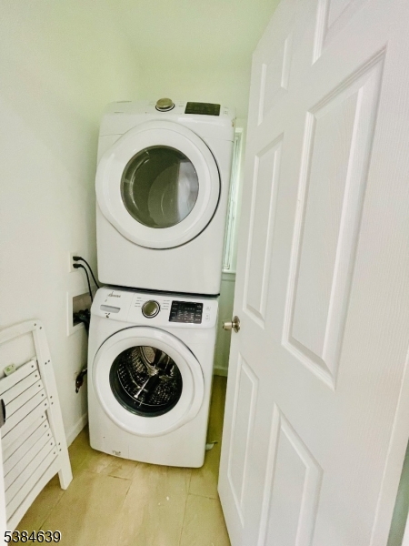 169 Hillside Avenue, Unit 2 Glen Ridge, NJ 07028 - Photo 9 of 10 a utility room with dryer and washer