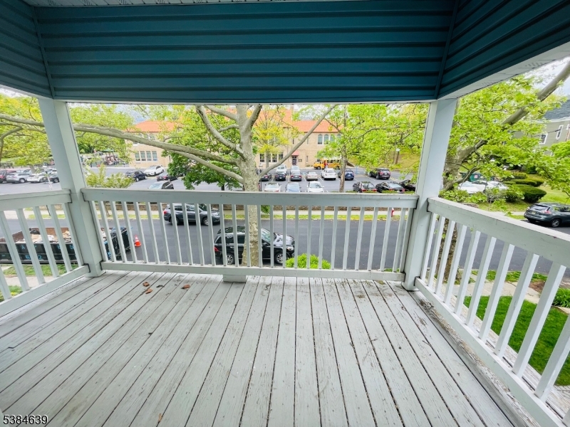 169 Hillside Avenue, Unit 2 Glen Ridge, NJ 07028 - Photo 10 of 10 a balcony with wooden floor and outdoor space