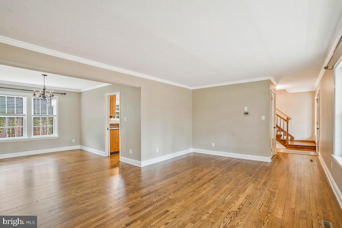 44576 Cedar Court California, MD 20619 - Photo 11 of 45 a view of empty room with wooden floor and window