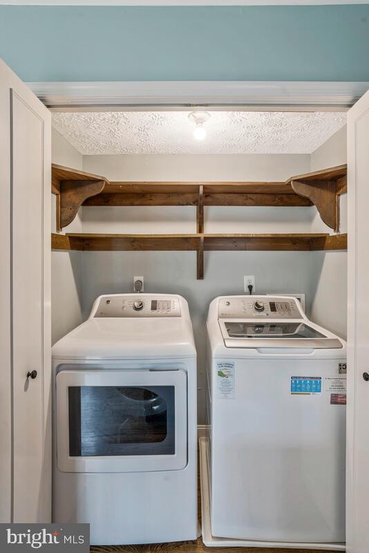 44576 Cedar Court California, MD 20619 - Photo 18 of 45 a utility room with dryer and washer