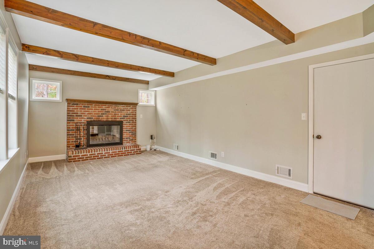 44576 Cedar Court California, MD 20619 - Photo 19 of 45 a view of empty room with a fireplace