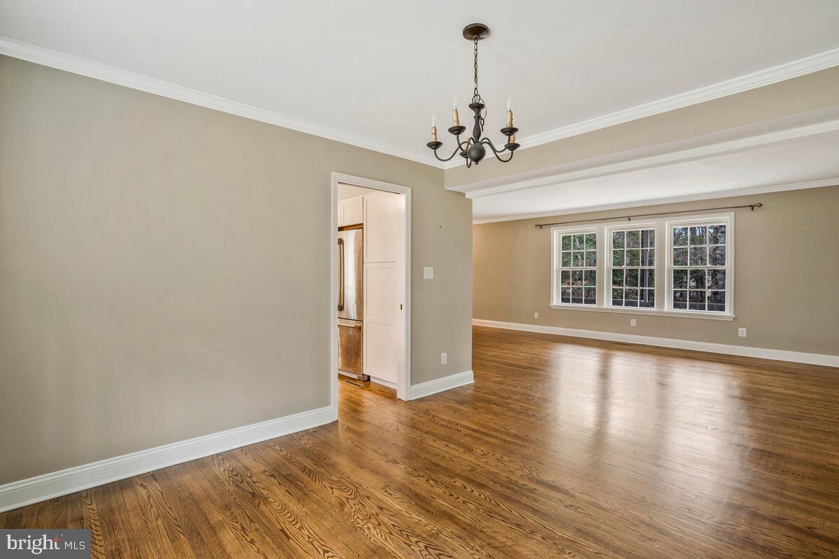 44576 Cedar Court California, MD 20619 - Photo 8 of 45 wooden floor in an empty room with a window