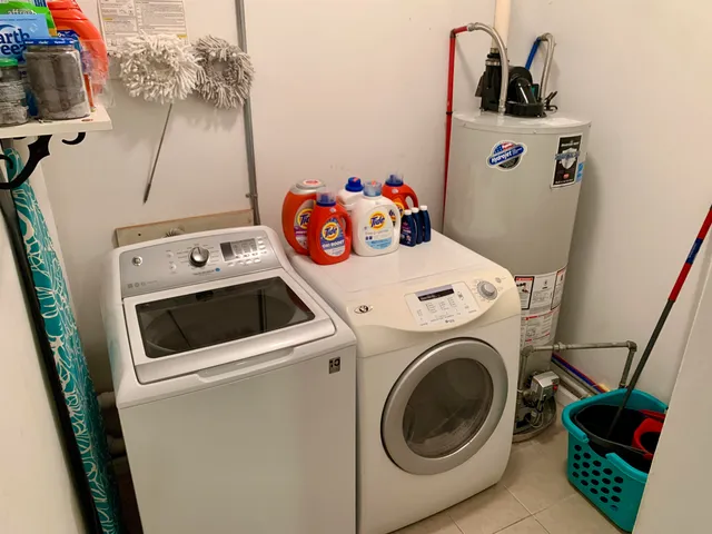 a utility room with dryer and washer