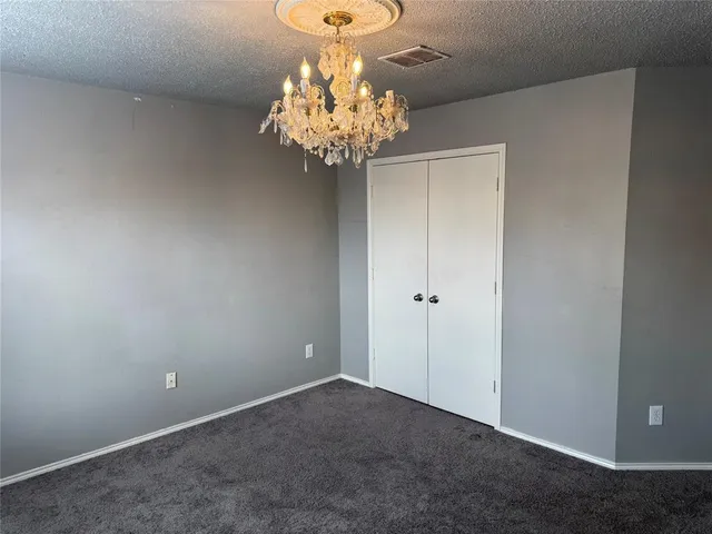 a view of a chandelier in a room