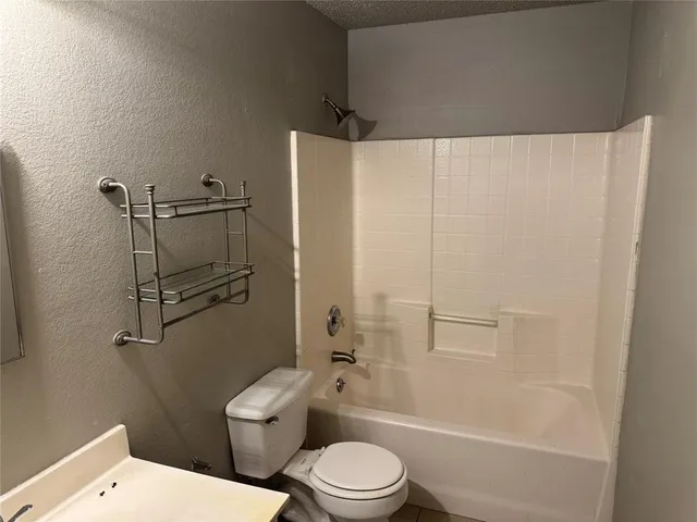 a view of a chandelier in big room