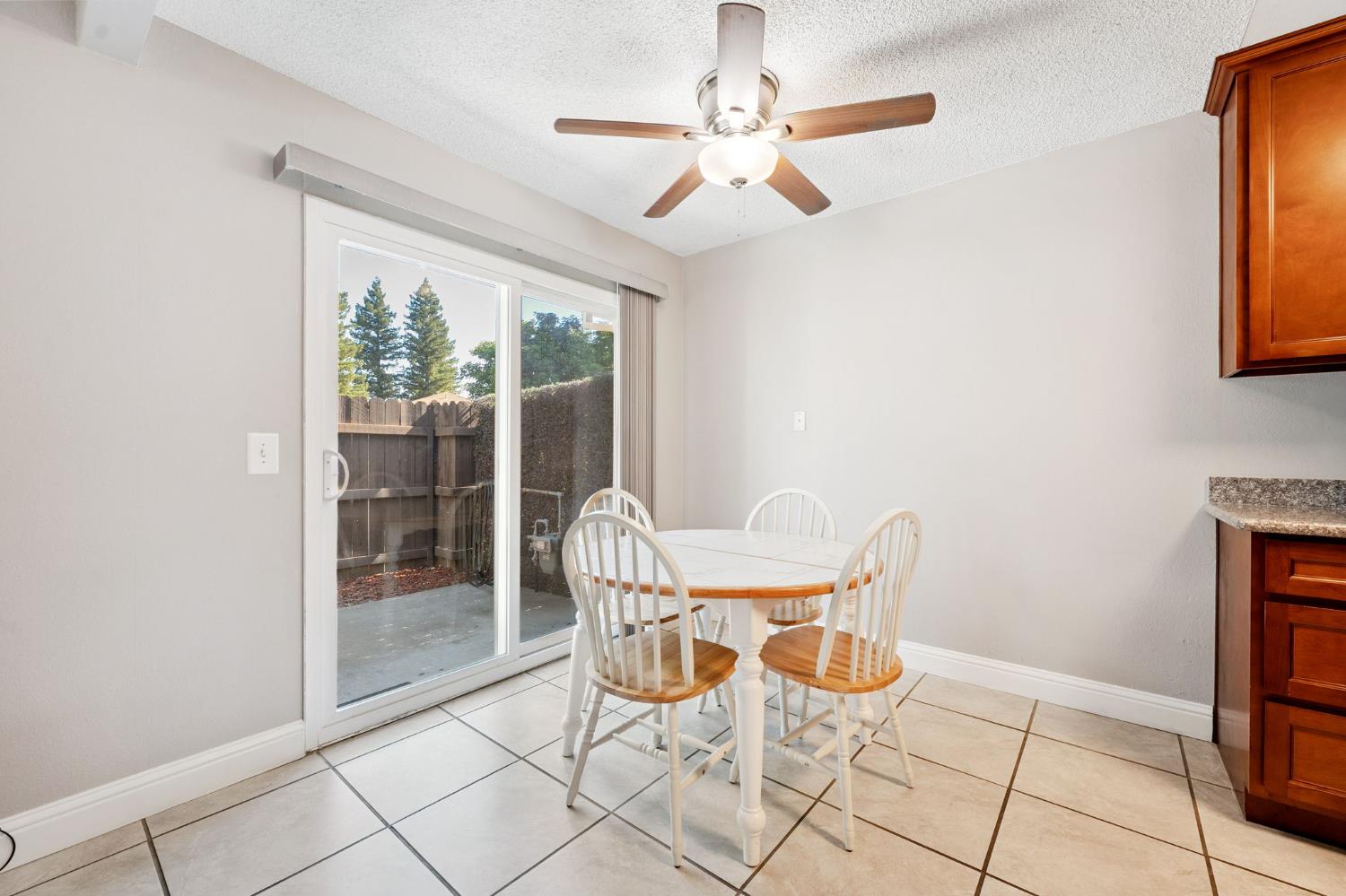 56 West Elliot Street, Unit 61 Woodland, CA 95695 - Photo 5 of 17 a dining room with furniture and window