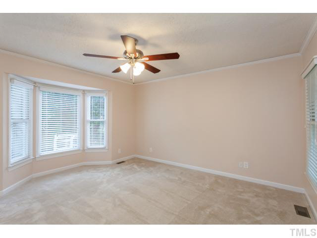 7312 Wilderness Road Raleigh, NC 27613 - Photo 13 of 23 a view of an empty room with a window