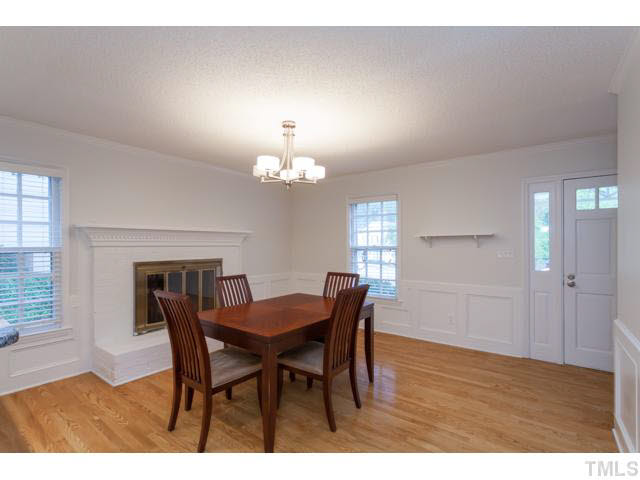7312 Wilderness Road Raleigh, NC 27613 - Photo 10 of 23 a view of a dining room with furniture and window