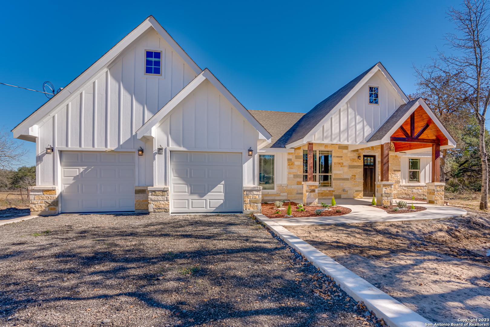 509 County Road 6846 Lytle, TX 78052 - Photo 1 of 1 a view of house with backyard