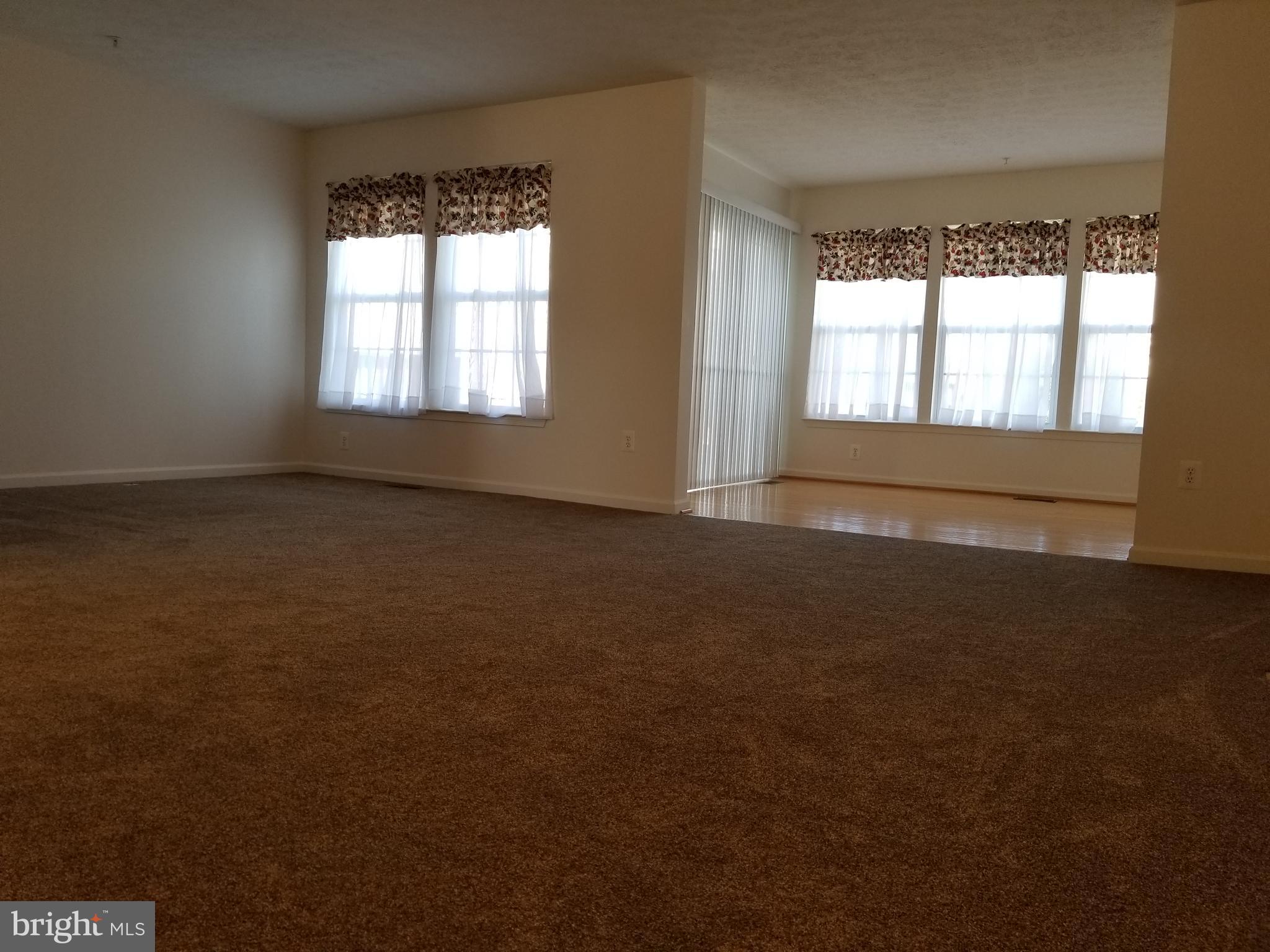9736 Selfridge Road Baltimore, MD 21220 - Photo 16 of 35 a view of an empty room with a window