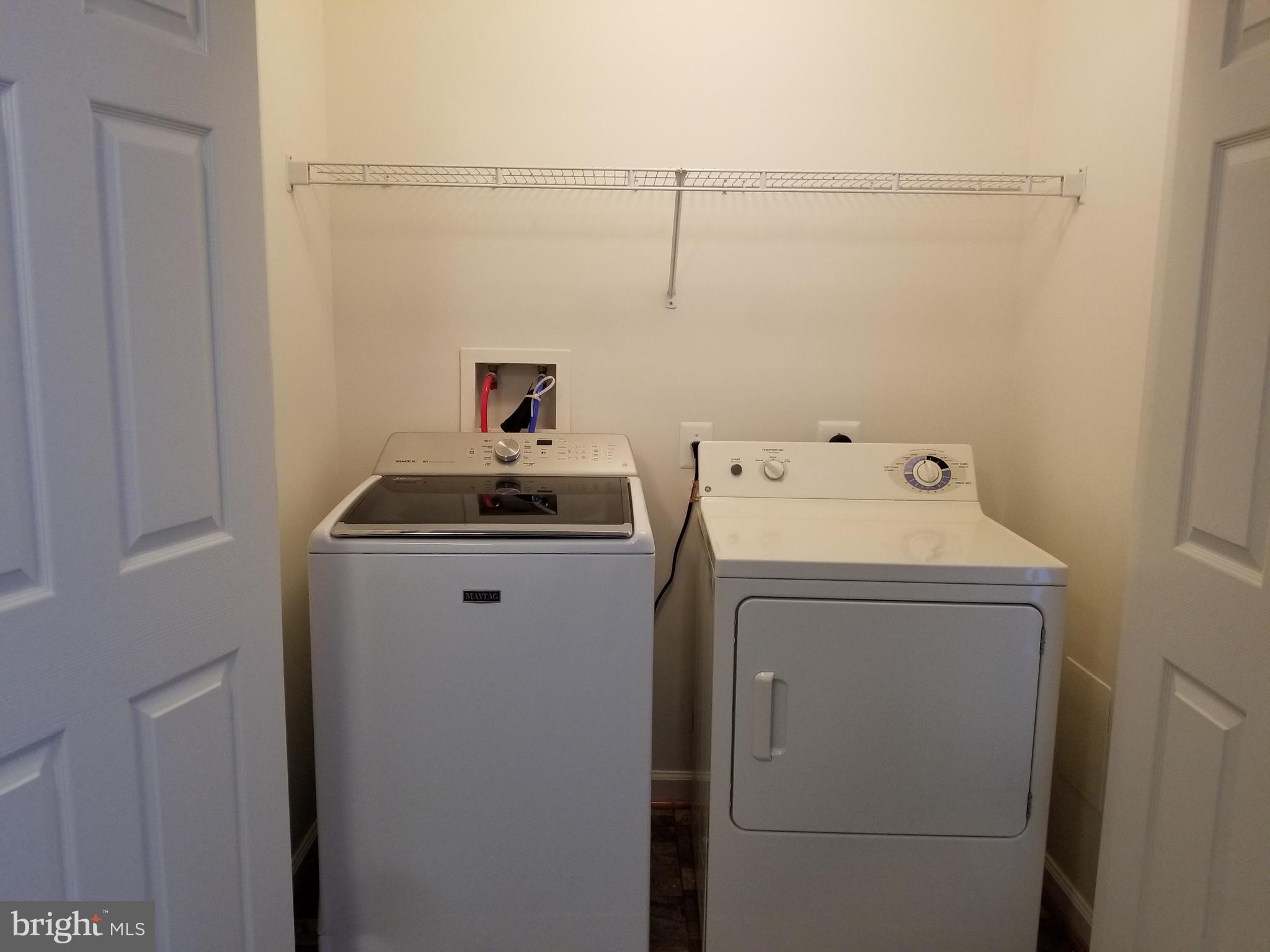 9736 Selfridge Road Baltimore, MD 21220 - Photo 35 of 35 a utility room with dryer and washer