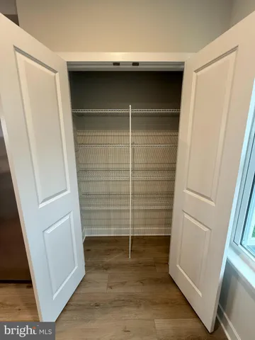 a view of a bathroom from a hallway