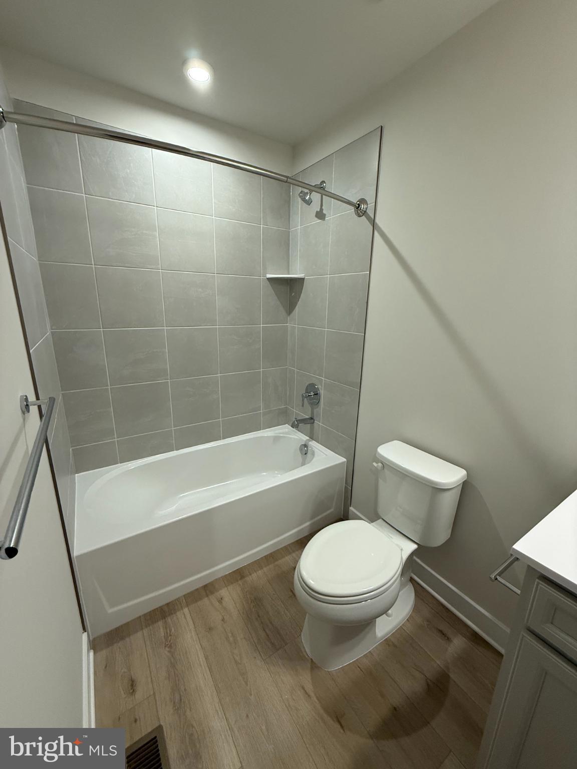 6932 Braxton Springs Way Spotsylvania, VA 22553 - Photo 21 of 33 a bathroom with a toilet and a bath tub