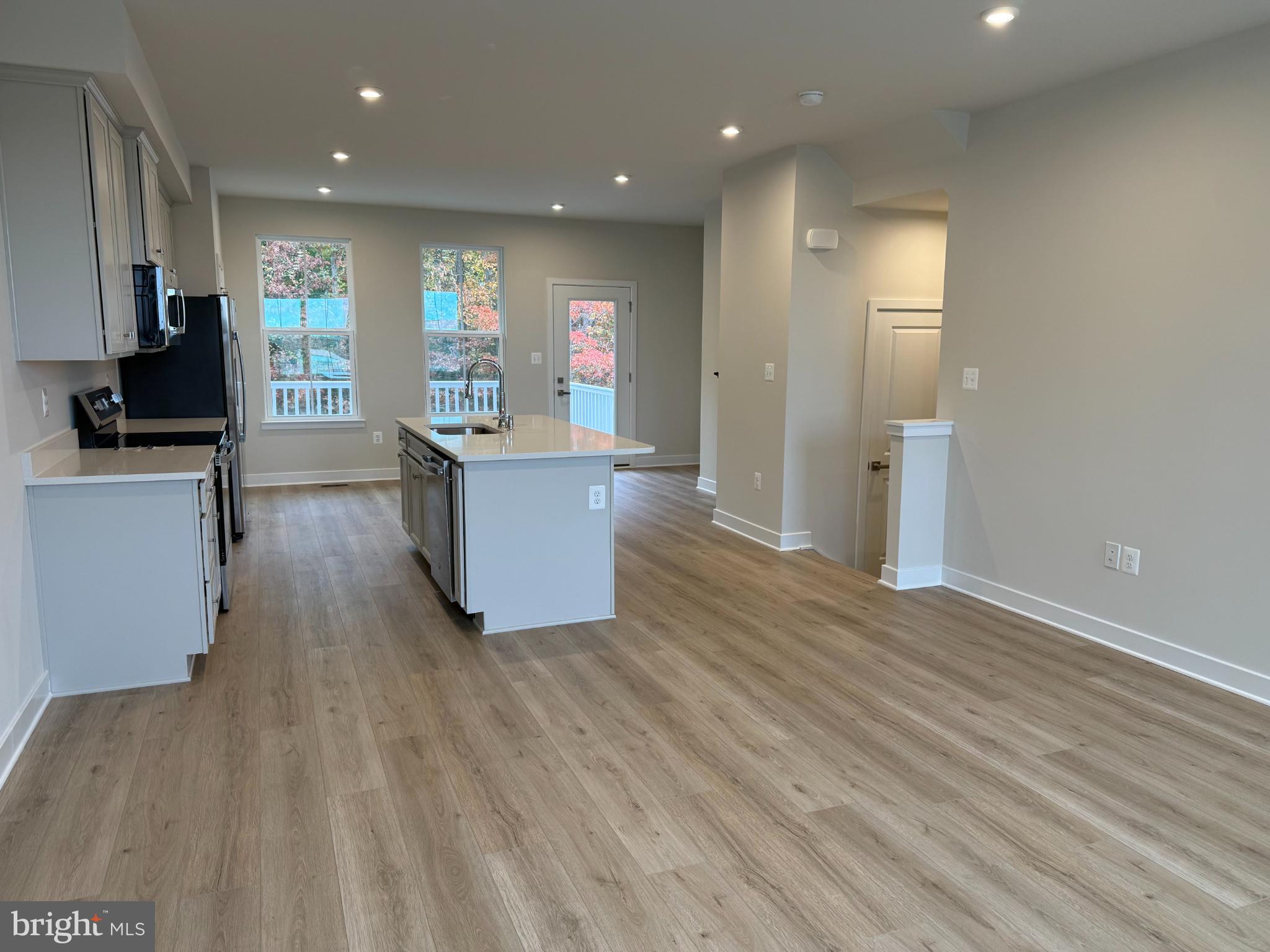6932 Braxton Springs Way Spotsylvania, VA 22553 - Photo 10 of 33 a view of kitchen with cabinets and wooden floor