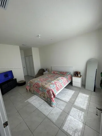 a view of a hallway with entryway