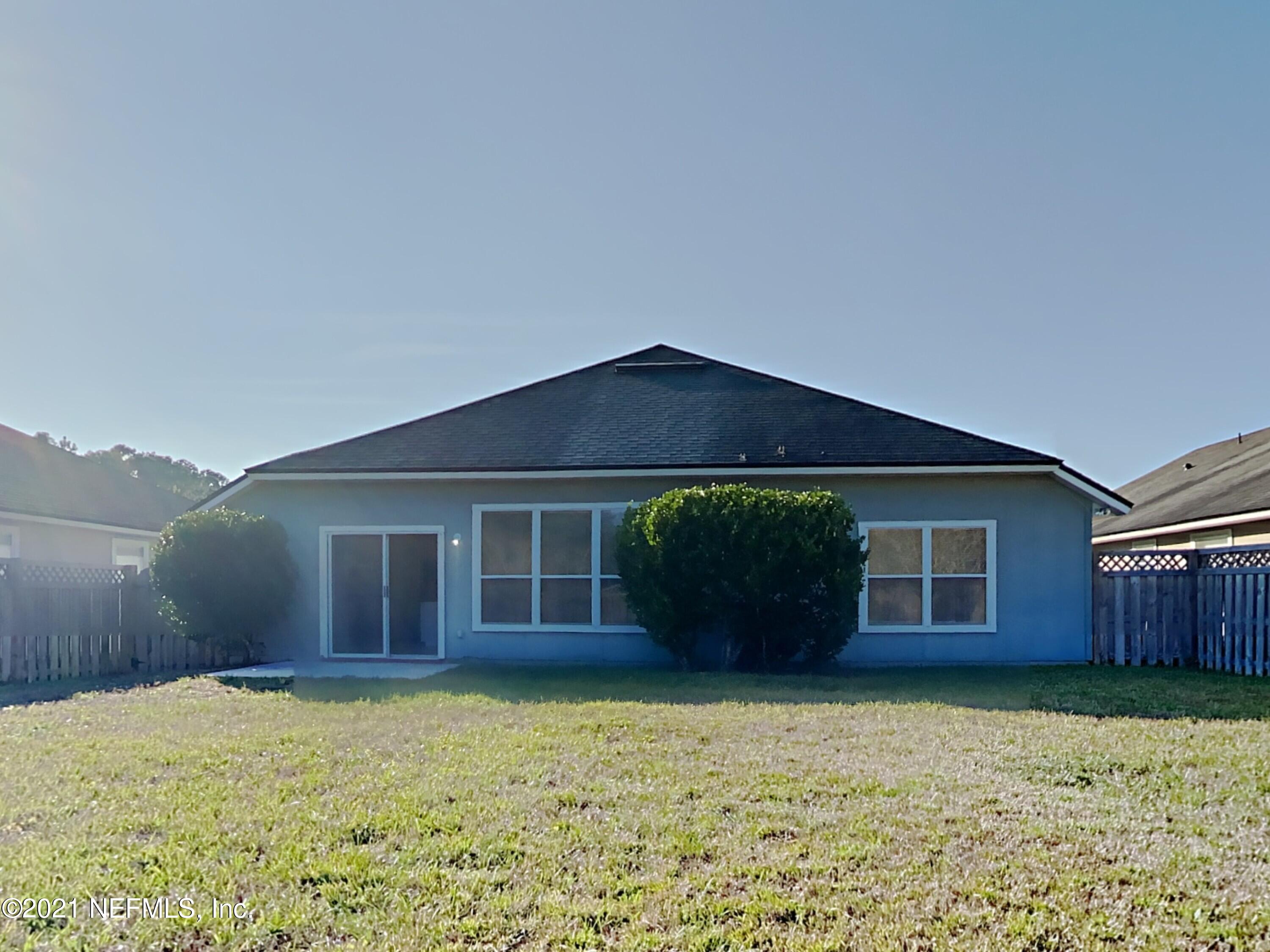 600 Birchbark Trail St. Augustine, FL 32092 - Photo 15 of 16 a front view of a house with a yard