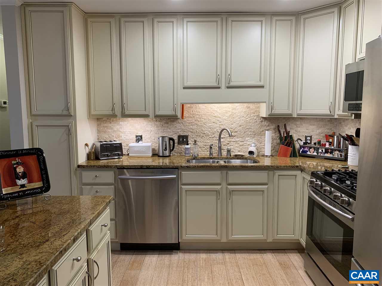 2 Appletree Road Palmyra, VA 22963 - Photo 12 of 49 a kitchen with granite countertop a sink stove and cabinets