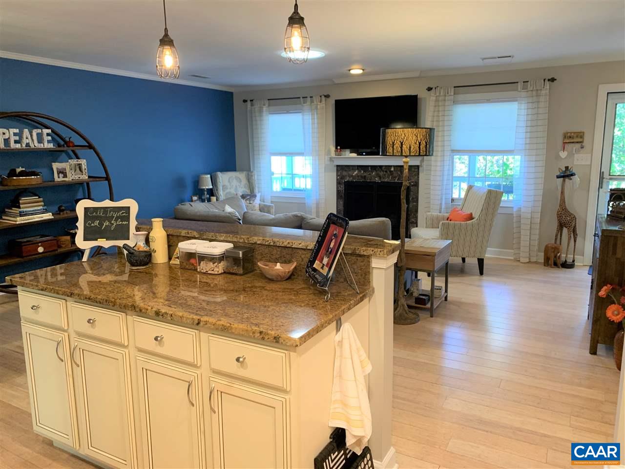 2 Appletree Road Palmyra, VA 22963 - Photo 8 of 49 a kitchen with sink cabinets and dining table