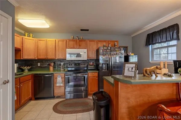 $275,000 | 284 Storm Cove Drive, Linn Creek, MO 65052