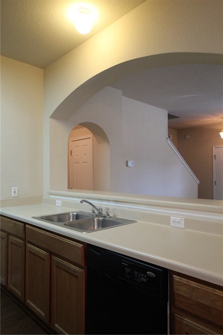 9600 Magna Carta Loop, Unit 177 Austin, TX 78754 - Photo 13 of 25 a bathroom with a sink and a mirror