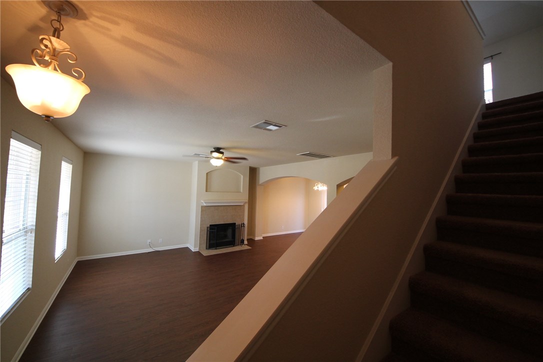 9600 Magna Carta Loop, Unit 177 Austin, TX 78754 - Photo 14 of 25 a view of entryway and hall with wooden floor