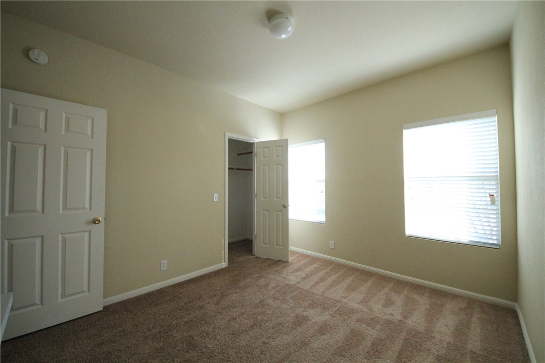 9600 Magna Carta Loop, Unit 177 Austin, TX 78754 - Photo 18 of 25 an empty room with windows
