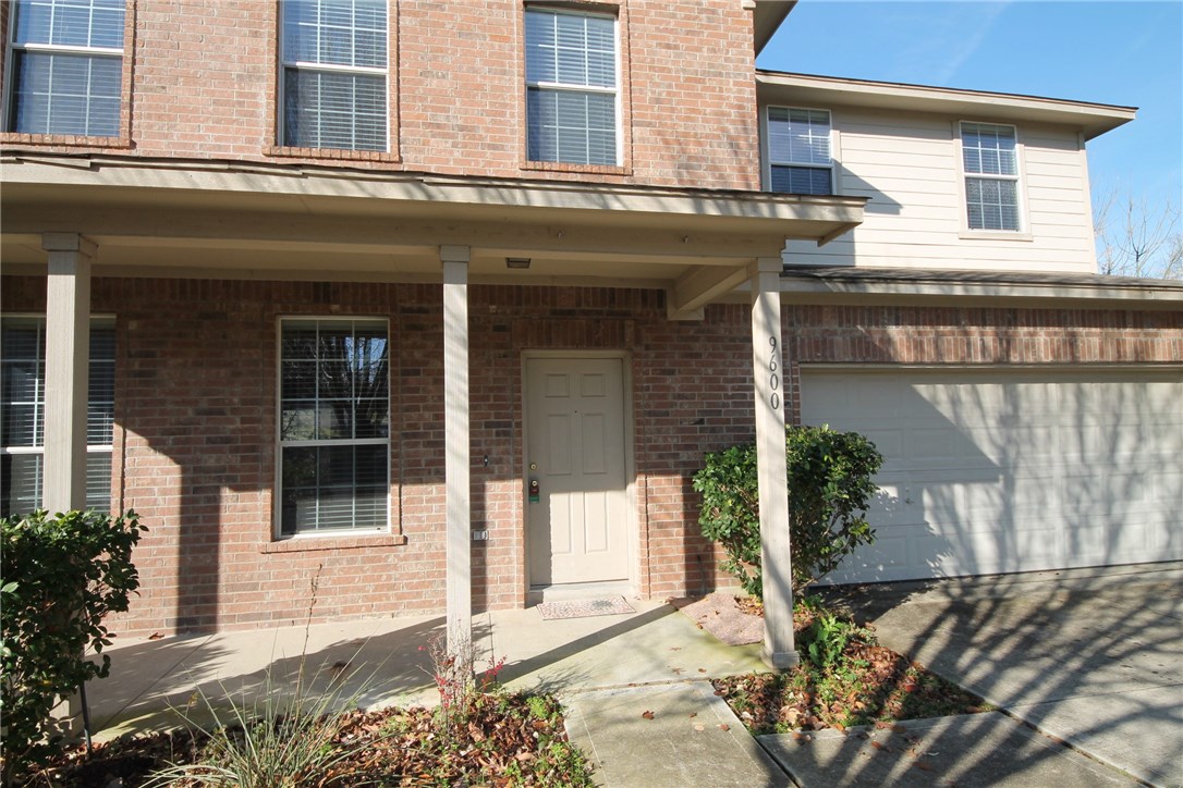 9600 Magna Carta Loop, Unit 177 Austin, TX 78754 - Photo 2 of 25 a view of a building with potted plants