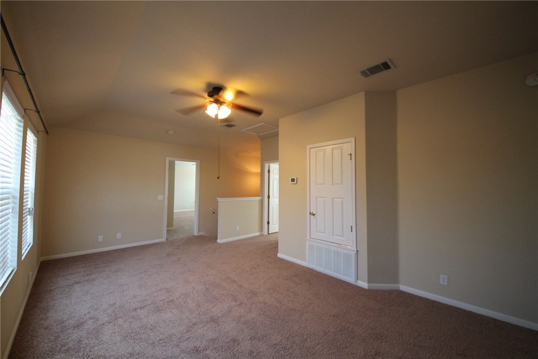 9600 Magna Carta Loop, Unit 177 Austin, TX 78754 - Photo 22 of 25 wooden floor in an empty room with a window