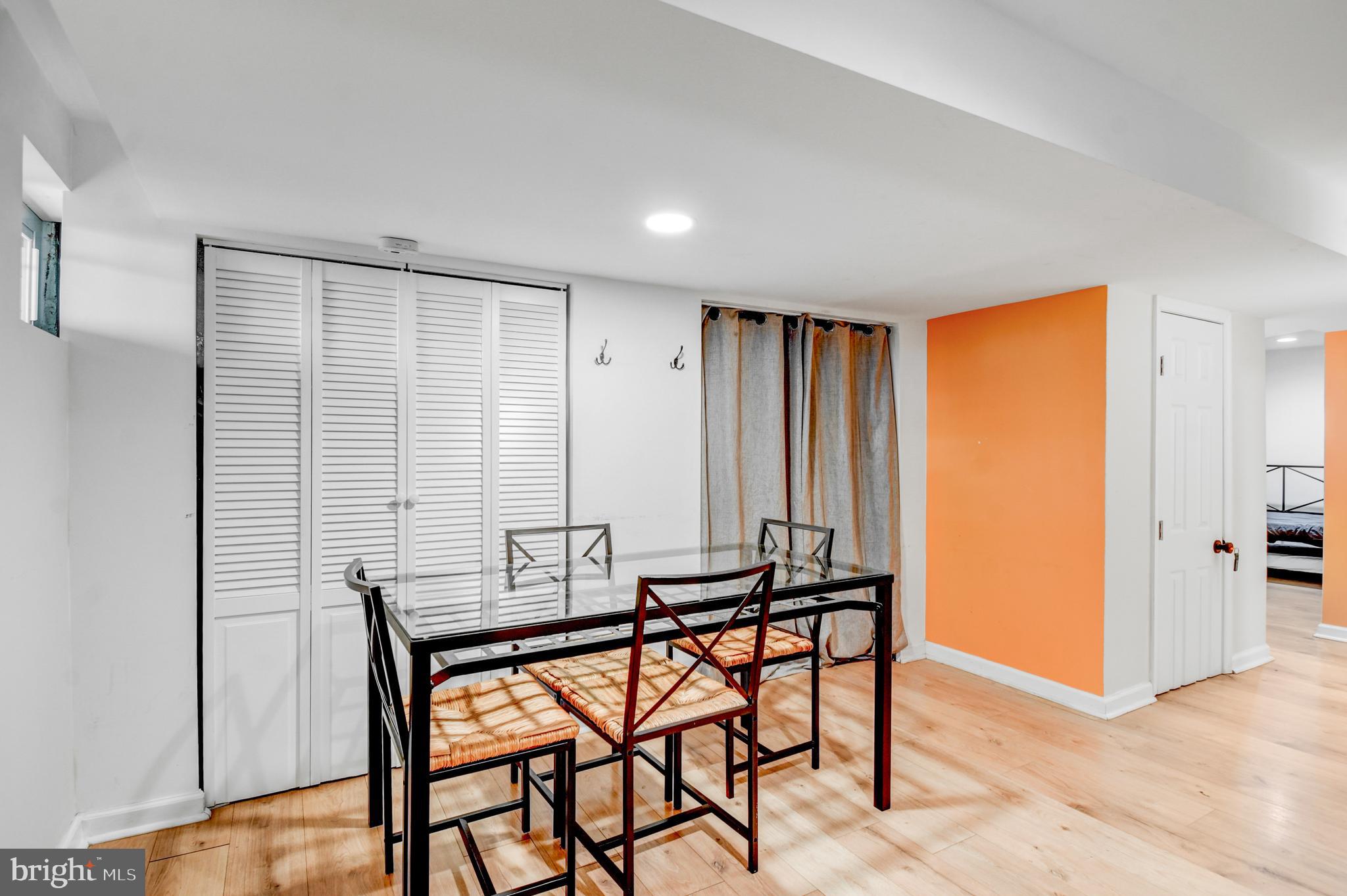 1371 Adams Street Northeast Washington, DC 20018 - Photo 29 of 34 a dining room with furniture and window