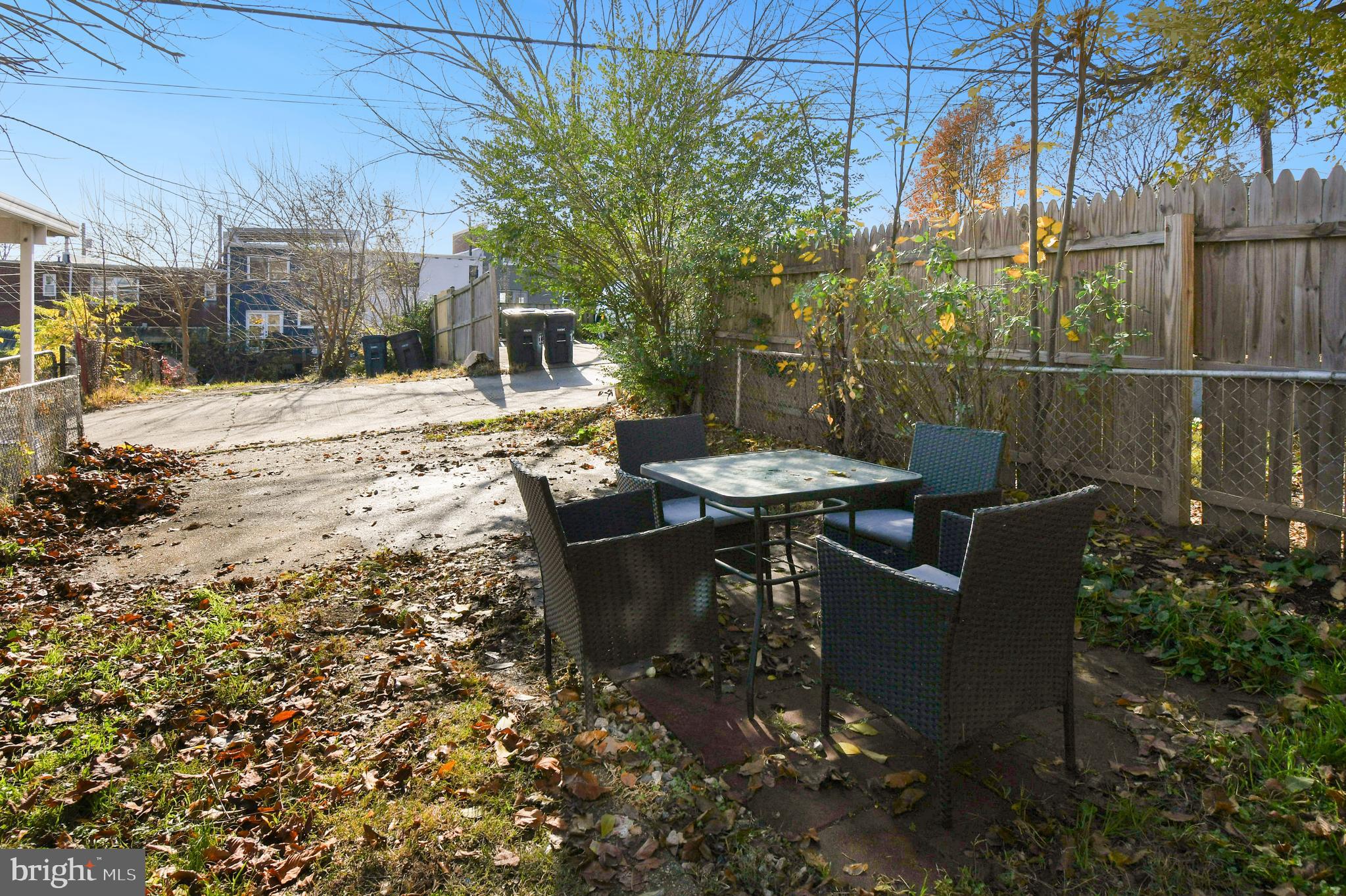 1371 Adams Street Northeast Washington, DC 20018 - Photo 34 of 34 a view of a patio with couches table and chairs and potted plants