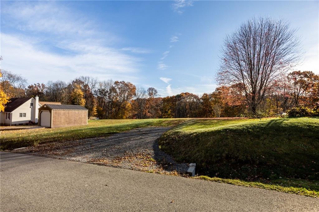 940 Rose Point-Harlansburg Road New Castle, PA 16101 - Photo 2 of 11 a view of a house with a yard