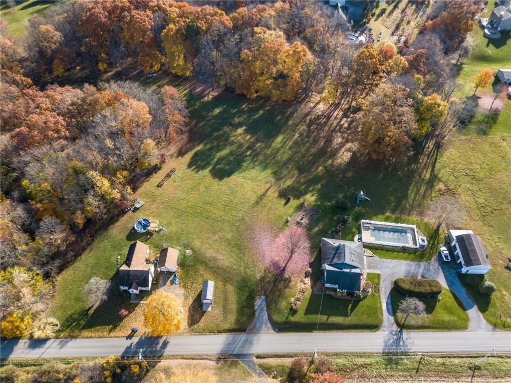 940 Rose Point-Harlansburg Road New Castle, PA 16101 - Photo 7 of 11 an aerial view of houses with yard