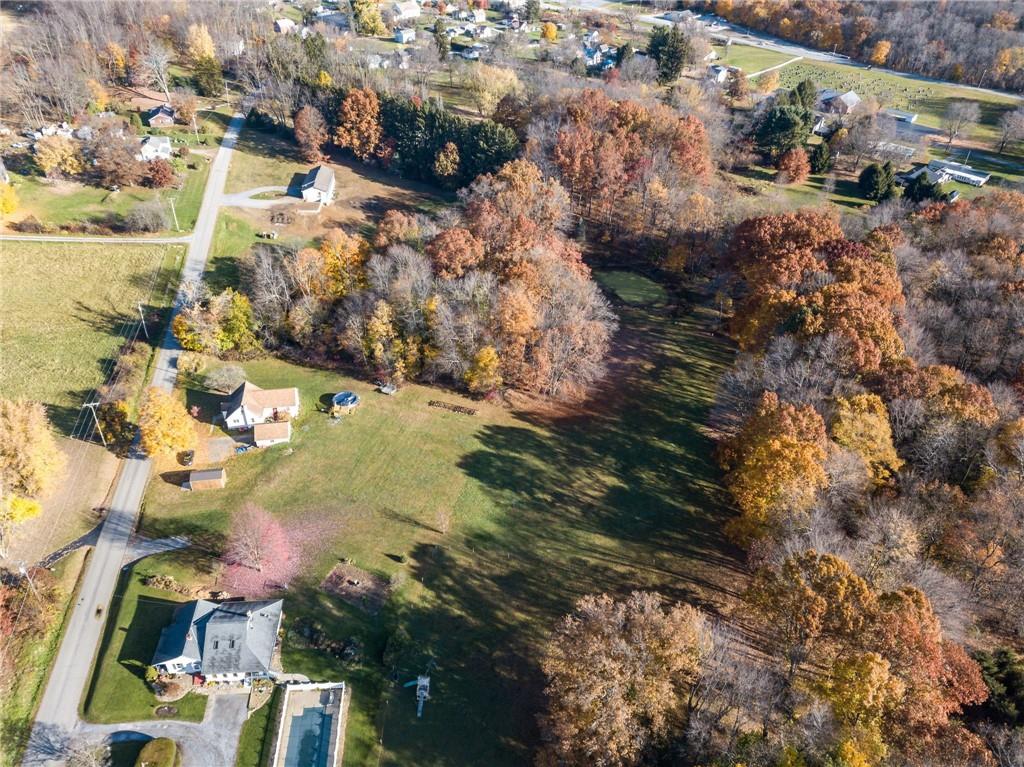 940 Rose Point-Harlansburg Road New Castle, PA 16101 - Photo 9 of 11 an aerial view of residential houses with outdoor space