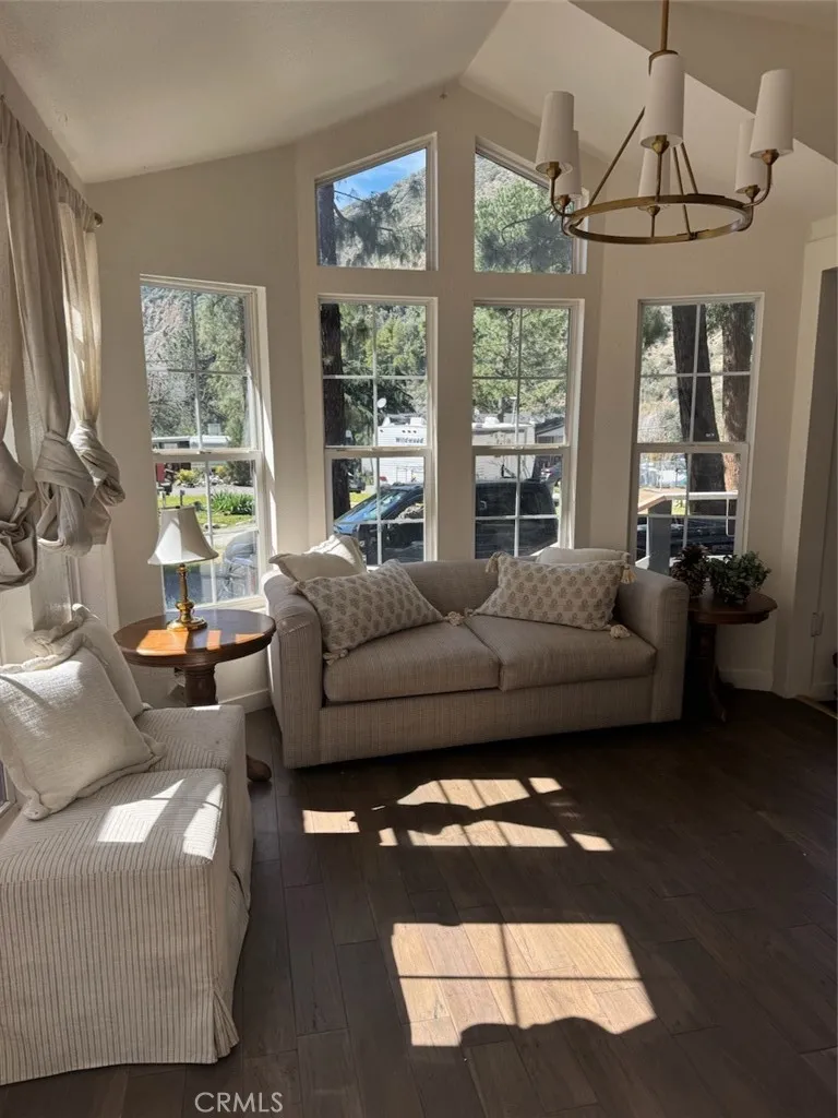 24210 East East Fork, Unit 19 Azusa, CA 91702 - Photo 2 of 8 a living room with furniture and a large window
