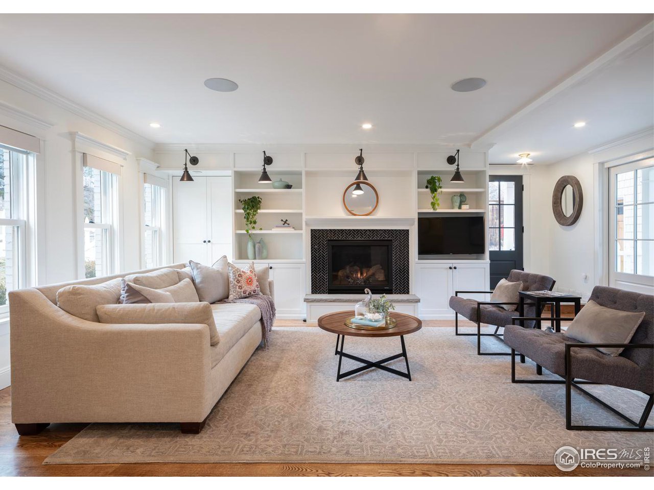 2303 Bluff Street Boulder, CO 80304 - Photo 12 of 40 a living room with furniture and a fireplace