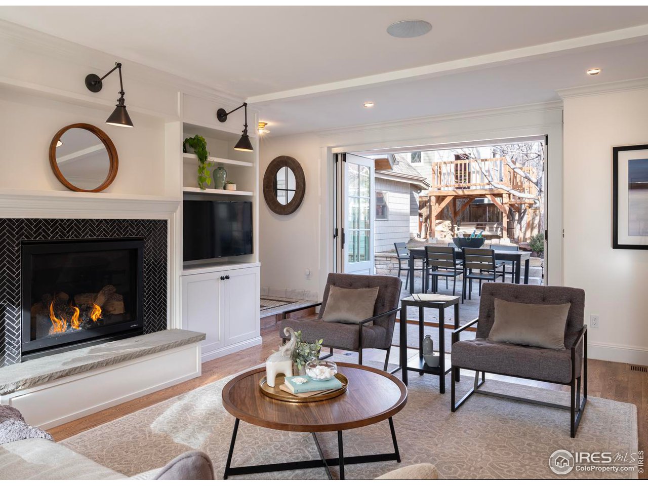 2303 Bluff Street Boulder, CO 80304 - Photo 13 of 40 a living room with furniture and a fireplace