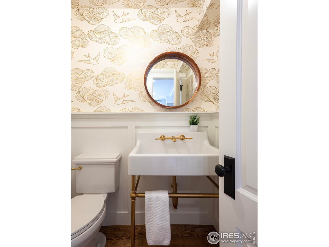2303 Bluff Street Boulder, CO 80304 - Photo 16 of 40 a bathroom with a sink toilet and a mirror