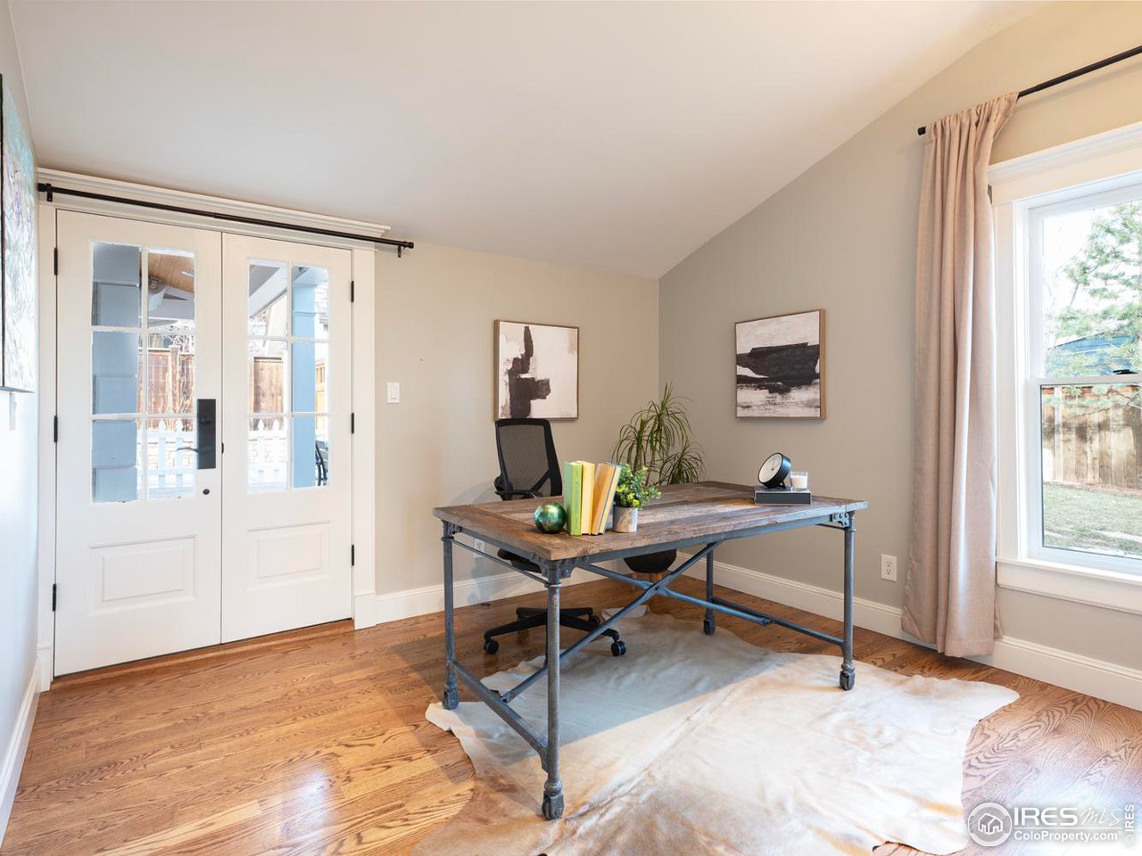2303 Bluff Street Boulder, CO 80304 - Photo 17 of 40 a work room with furniture and a window