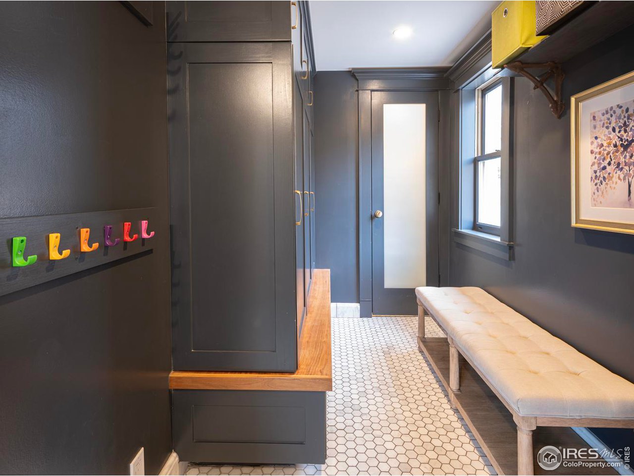 2303 Bluff Street Boulder, CO 80304 - Photo 19 of 40 a bedroom with a bed and a window