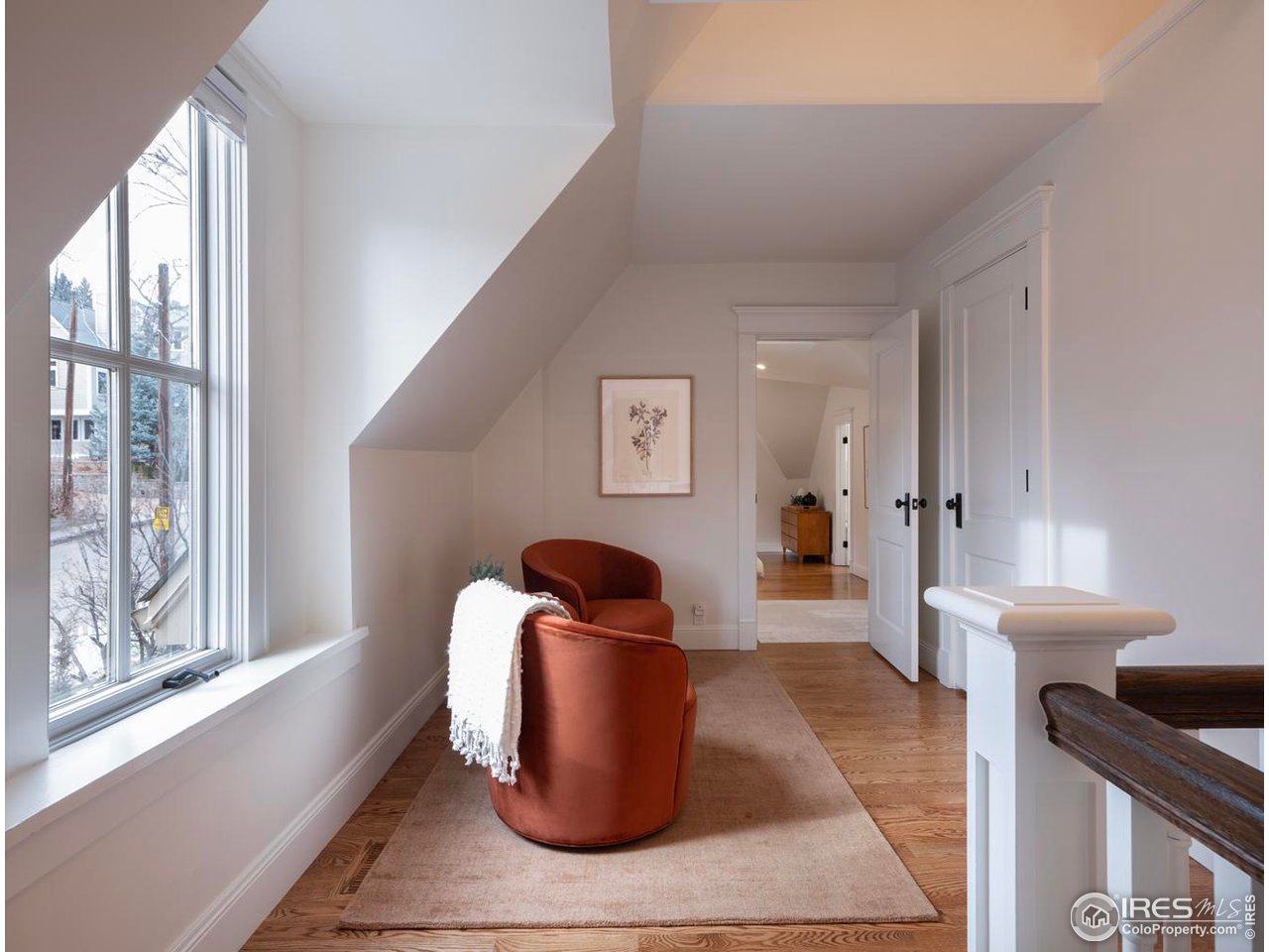 2303 Bluff Street Boulder, CO 80304 - Photo 27 of 40 a living room with furniture rug and window